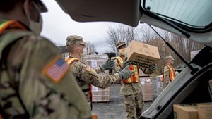 Vermont National Guard members distributing MREs in South Hero