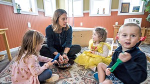 Kate Driver playing with kids in 2018 at Georgia's Next Generation