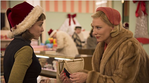 Cate Blanchett looks like she has a Christmas present for Rooney Mara in Carol.