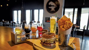 A beer flight, a Studio 54 cocktail and a house black bean burger with hot cheddar pork rinds at Black Flannel Brewing
