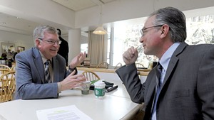 Jim Harrison, left, speaking with Senate Majority Leader Philip Baruth at the Statehouse