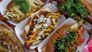 Topping-laden dogs at the Lucky Dogs pop-up at Hender's Bake Shop &amp; Caf&eacute;