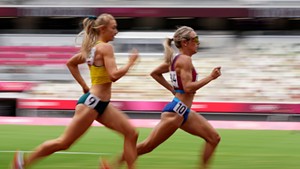 Elle Purrier St. Pierre leading Jessica Hull of Australia in a heat of the 1,500-meter race in Tokyo on Monday