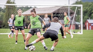 VT Fusion women’s soccer teammate Ilana Albert (center in green) fighting for the ball during a recent match