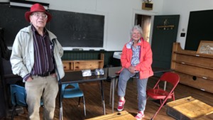 Rod Noble and Connie Quimby in the schoolhouse where both were students in the 1940s and 50s