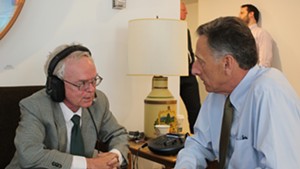 Mark Johnson, left, interviews then-governor Peter Shumlin at the Statehouse in 2015.