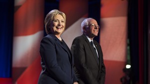Sen. Bernie Sanders and Hillary Clinton at a debate  in New Hampshire in February