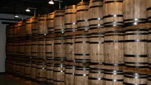Whiskey barrels in the aging room