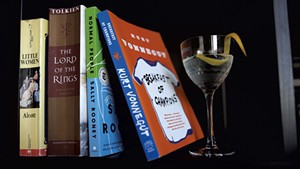 A Breakfast of Champions gin martini on a bookshelf