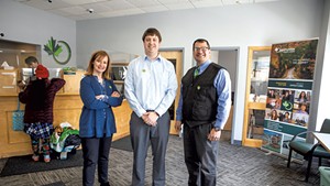 From left: Kate Laud, Tim Carpenter and Laz Manrique at Opportunities Credit Union