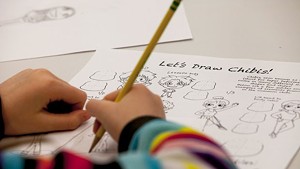 A worksheet introduces students to manga characters known as "chibis"