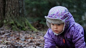 One-year-old Elise explores the forest