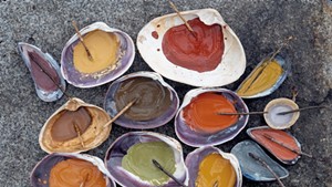 Paints made from natural ingredients with stick brushes