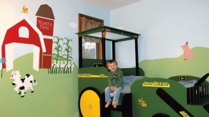 Wyatt Bogie at age 3, when his tractor bed was brand new
