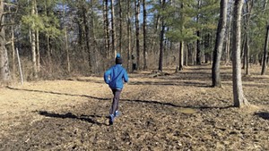 Heather's son, Jesse, explores a muddy field