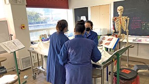First-year medical students Molly Hurd, Aina Rattu and Anika Advant working in the UVM anatomy lab