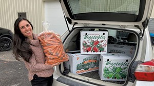 ACORN Food Hub manager Jessica Purks with an order of local produce for Bobcat Caf&eacute; &amp; Brewery