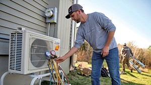 James Zeno of Heat Pump Services installing a heat pump in Charlotte