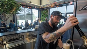 Shane Rumrill pulling a Heady Topper from the caskerator
