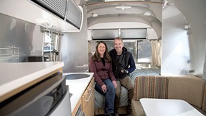 Tom and Lori Piper inside their Airstream