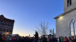 Reverend Paul Olsson speaking at the vigil