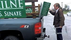 Scott Milne unloading campaign signs at a  diner in Pittsford