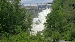 Water being released from behind the Waterbury Dam on Thursday