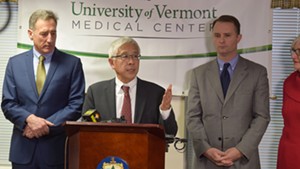 Dr. Harry Chen (center) at a 2015 press conference.