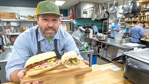 Patrick Garvin with the #33 sandwich at Mehuron's Market in Waitsfield