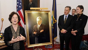 Artist August Burns speaks at the unveiling of Peter Shumlin's official portrait.