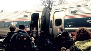 Passengers boarding the Amtrak Vermonter in Essex Junction