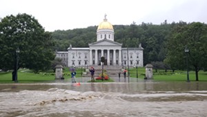 Floodwaters flowing past the Vermont Statehouse