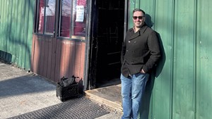 Sean Richards in front of the future Queen City Caf&eacute;