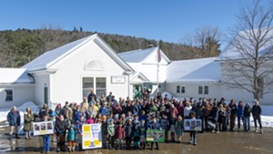 Residents outside Roxbury Village School in March