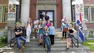 The Catamounts Arts staff in front of their building in St. Johnsbury