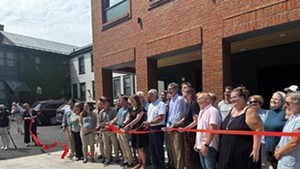 A ribbon cutting at Main Street Family Housing, a new affordable housing option in Burlington