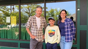 Andrew Machanic and Wendy Piotrowski with their son, Waylon