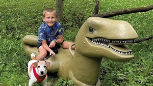 Deborah Van Ness' nephew, Joseph, on the T. rex