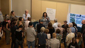 City attorney Jessica Brown (center) discussing the court system