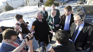 Then-senator Norm McAllister addresses reporters outside the Statehouse.