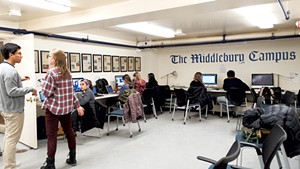 Student journalists working on an issue of the Campus