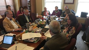 Members of the Vermont House Government Operations Committee discussing S.8.
