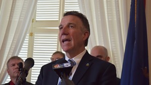 Gov. Phil Scott talks about teacher health care plans Tuesday at the Statehouse.