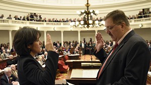 House Speaker Mitzi Johnson taking her oath of office in January with Secretary of State Jim Condos