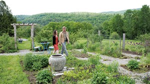 Sam and Kathryn Wyatt in their Lincoln home's front gardens