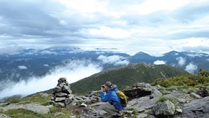 Steve Humphry taking a photo on Algonquin Peak