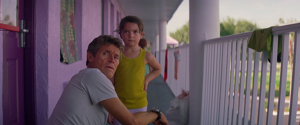 PURPLE HAZE Dafoe plays a motel manager and unofficial babysitter in Baker’s vital slice-of-life drama.