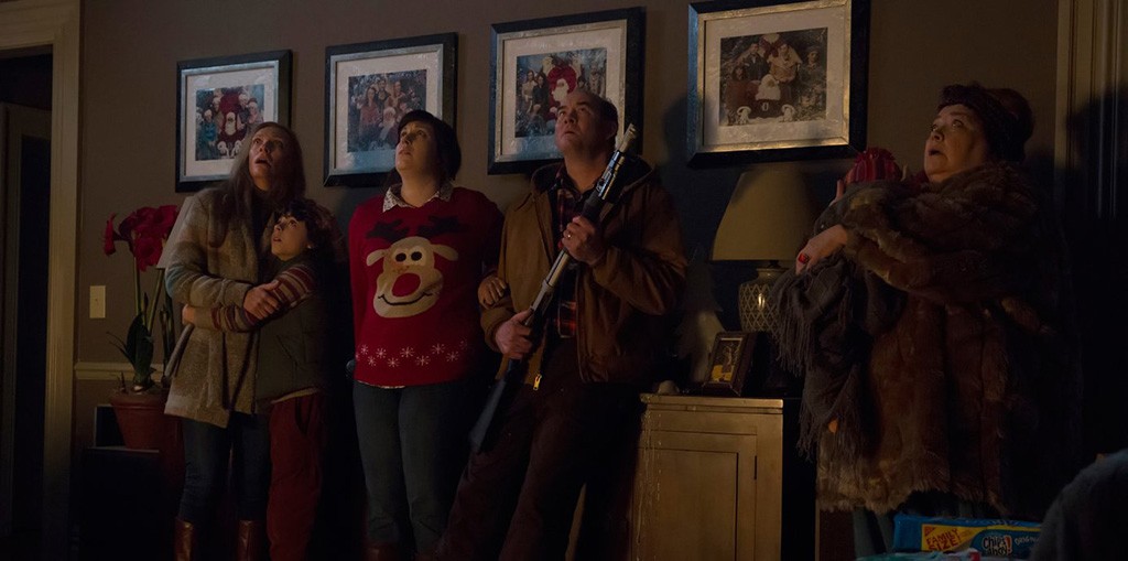 SCARY CHRISTMAS Ugly sweaters can’t save a family from its own lack of seasonal faith in Dougherty’s horror/comedy mishmash.