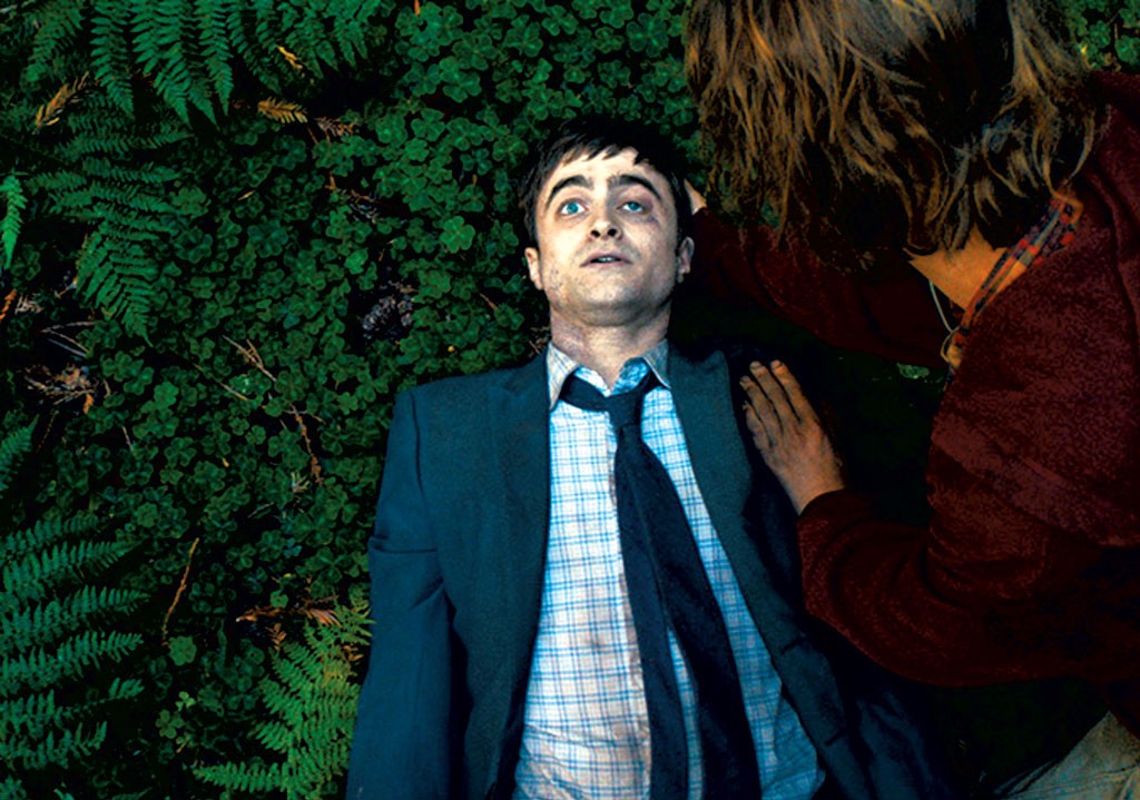 IT’S A GAS Radcliffe plays a corpse with flatulence issues in this extremely offbeat indie comedy.