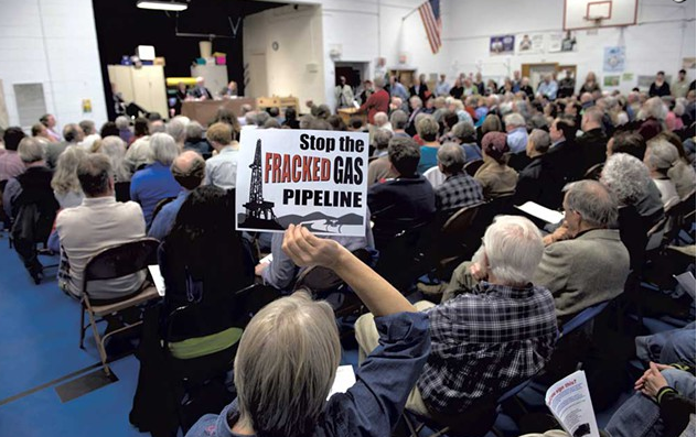 A crowded meeting on the Vermont Gas pipeline project at Shoreham Elementary School in 2014 - FILE: CALEB KENNA